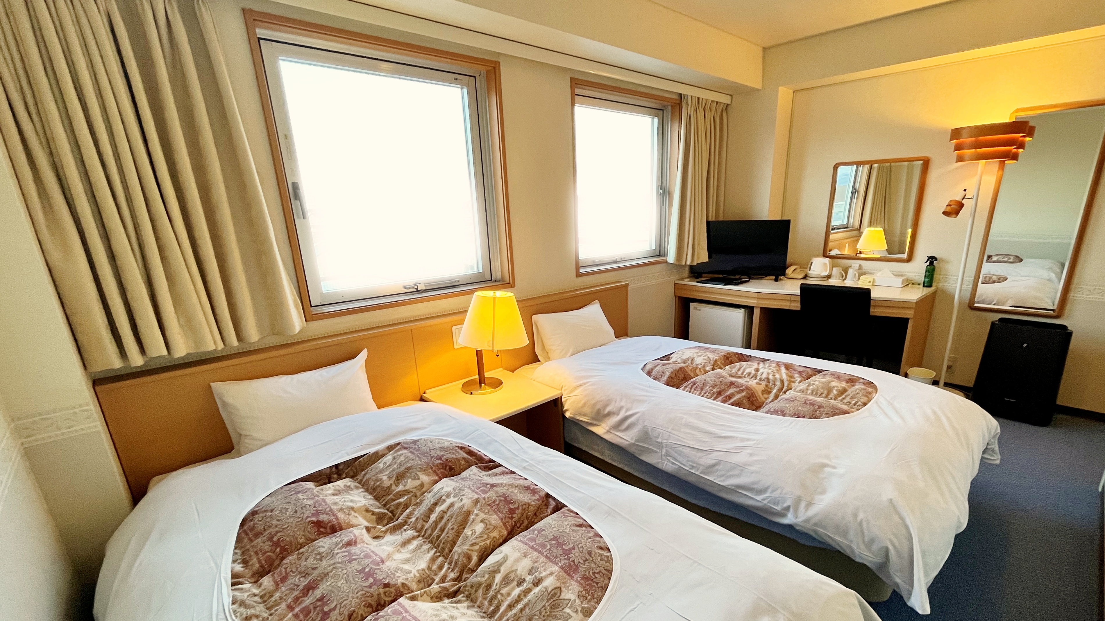 *【部屋一例（新館ツイン）】少し広めのお部屋でほっと寛げる、優しい雰囲気のお部屋です。