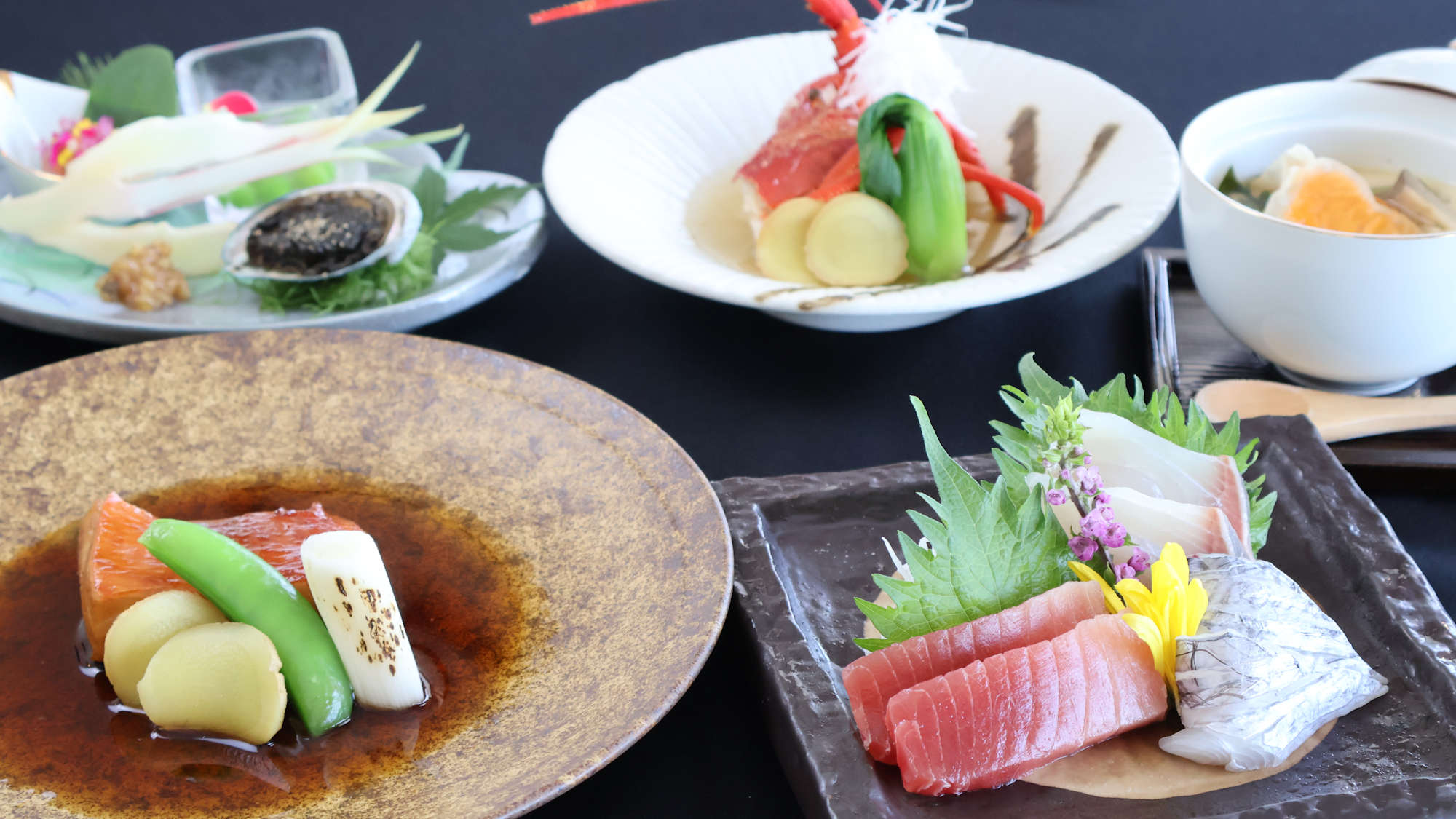 料理イメージ（金目鯛煮付けと伊勢海老の具足煮をチョイス）