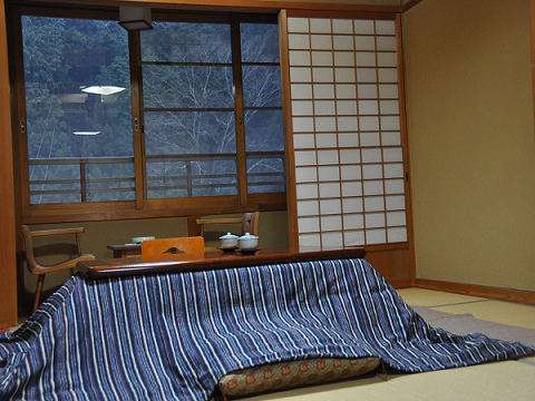[New Wing Japanese-style Room] A view with a kotatsu (Kotatsu is available in all rooms during the winter)