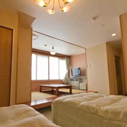 Kamar Jepang dan Barat dengan tempat tidur twin