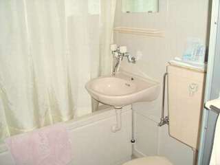 清潔感あふれるバスルーム