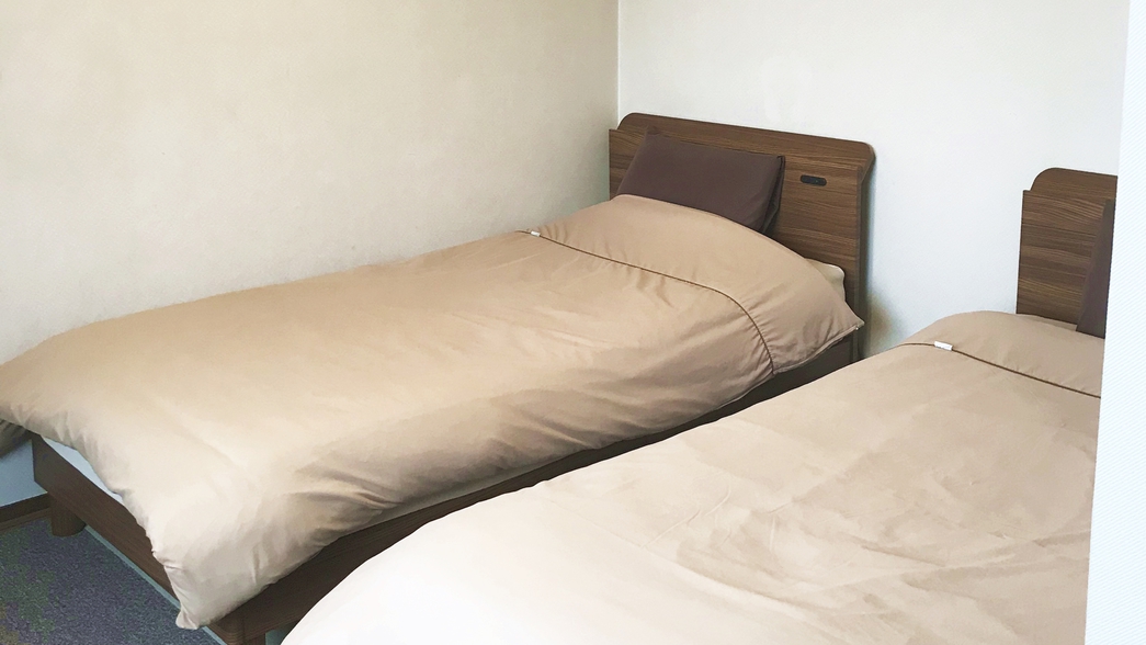 *【客室一例】洋室ツインルーム：シングルベッドが2台設置されたお部屋です。