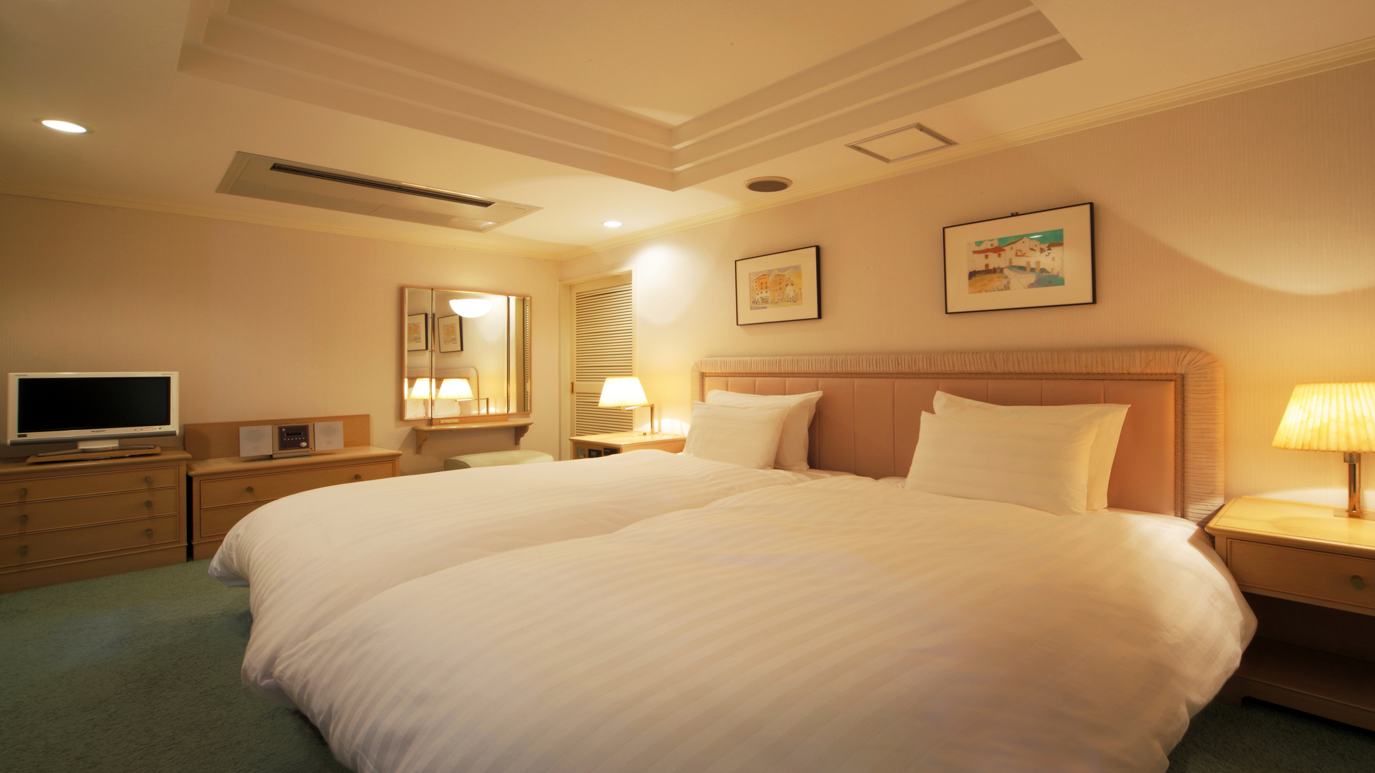 パノラマコーナースイート「サンセット」（ベッドルーム）