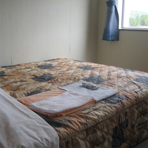 [Example of guest room] Double. Relax in the spacious double bed.