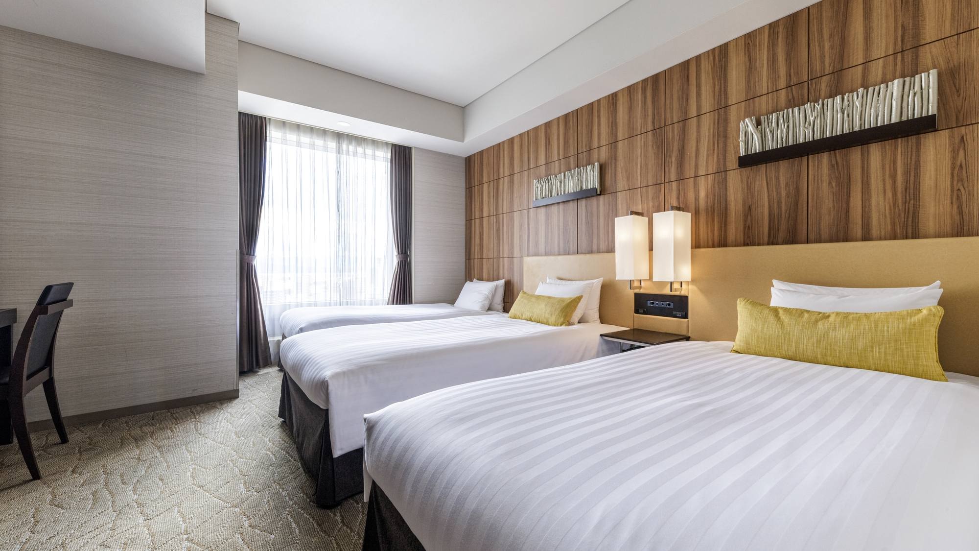 【桜島側スーペリアツインルーム 28.2㎡/3ベッド】ご家族や友人との滞在に最適な3ベッドタイプ。