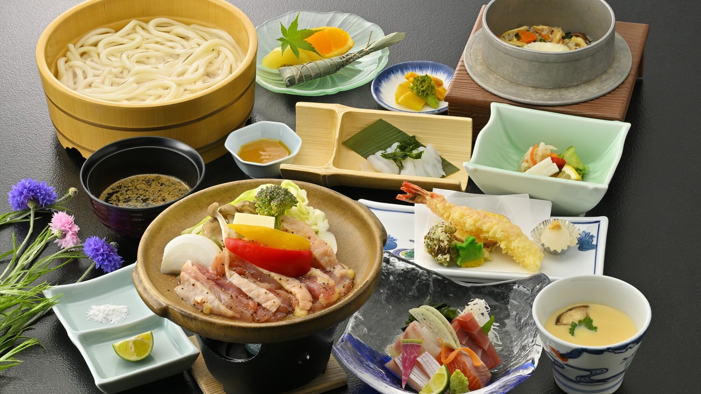 徳島名産「阿波尾鶏」の陶板焼き   