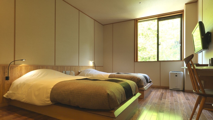 ◆和洋室（客室一例）／ツインベッド＋畳スペースの、52平米の和洋室