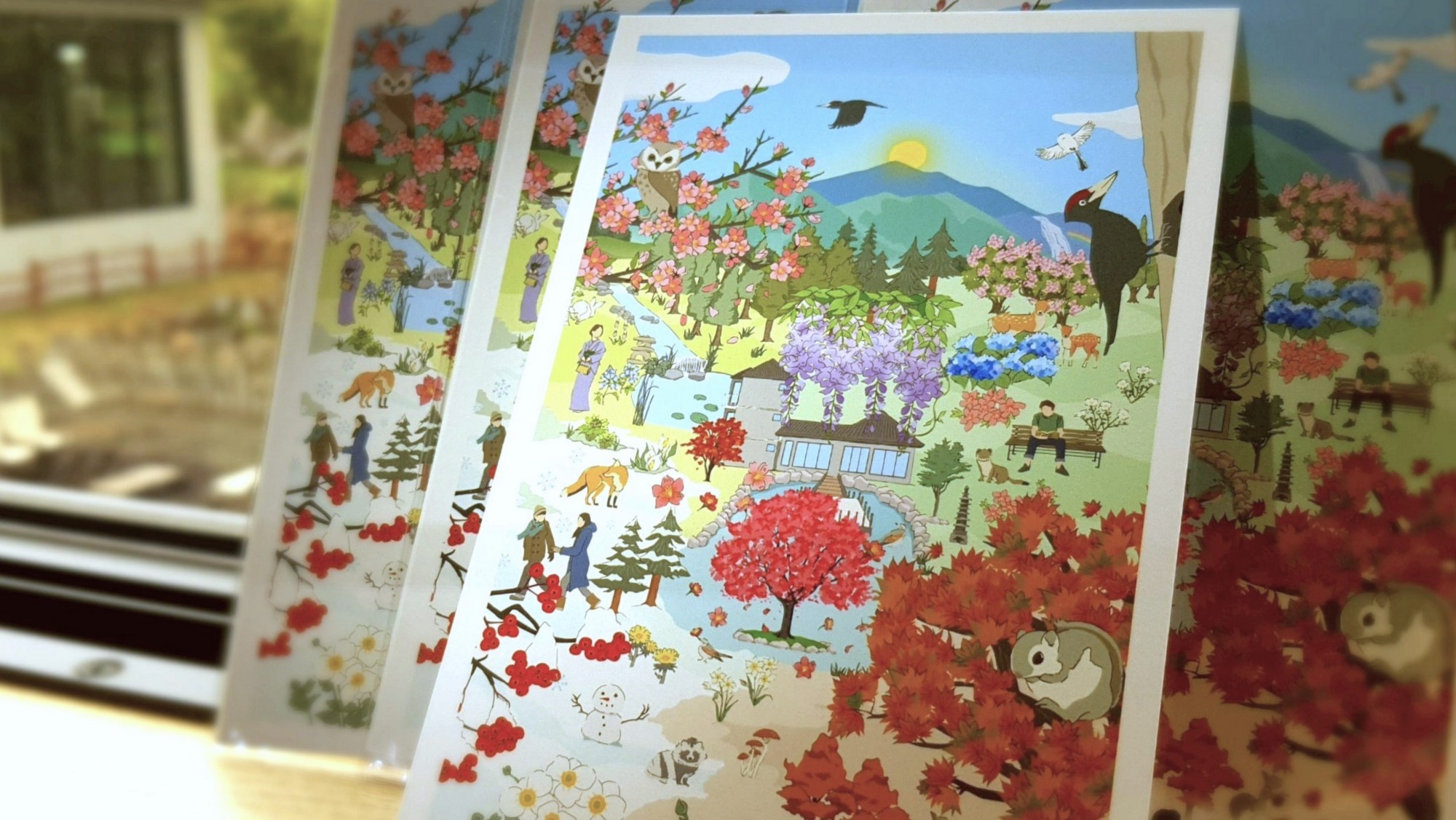 【オリジナルグッズ】佳松御苑の森の四季を描いた絵ハガキ。見るたびに旅の思い出が鮮やかによみがえるはず