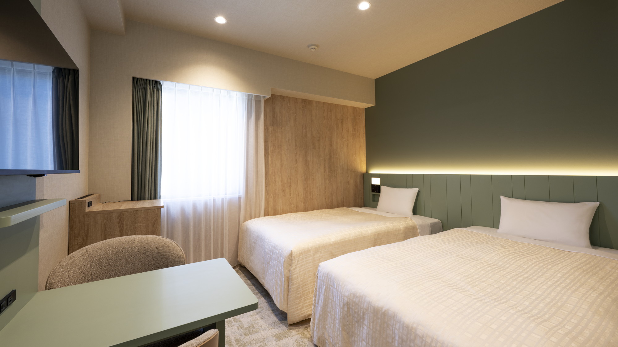 リニューアルツインルーム16㎡_ベッドまわり