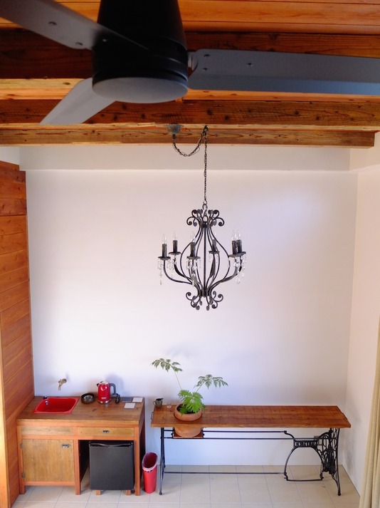 Room with small kitchen