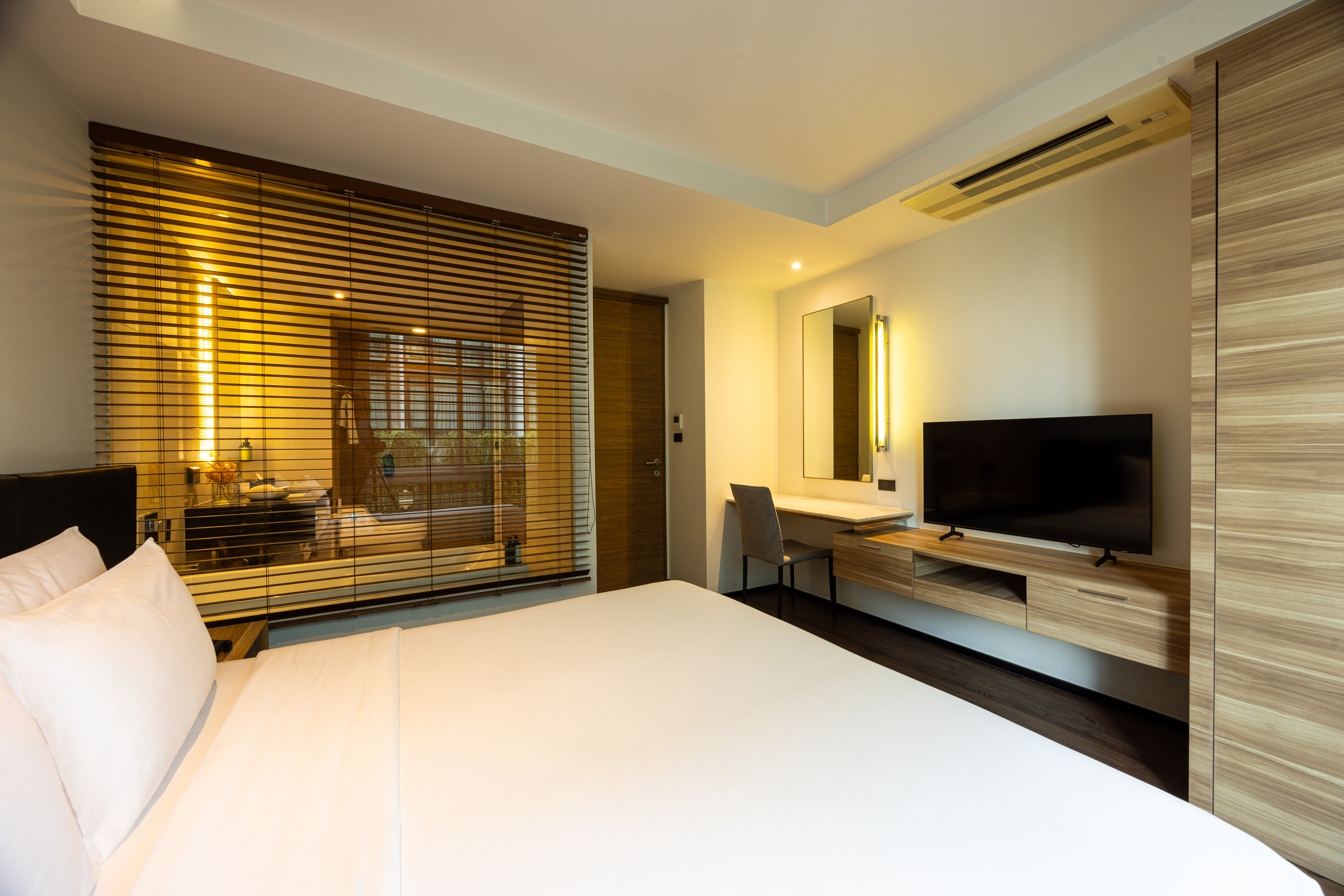 One Bedroom Deluxe Suite - Bedroom