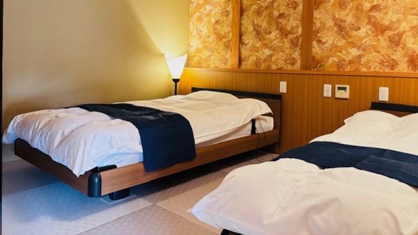 【新館露天風呂付き客室】客室のベッド