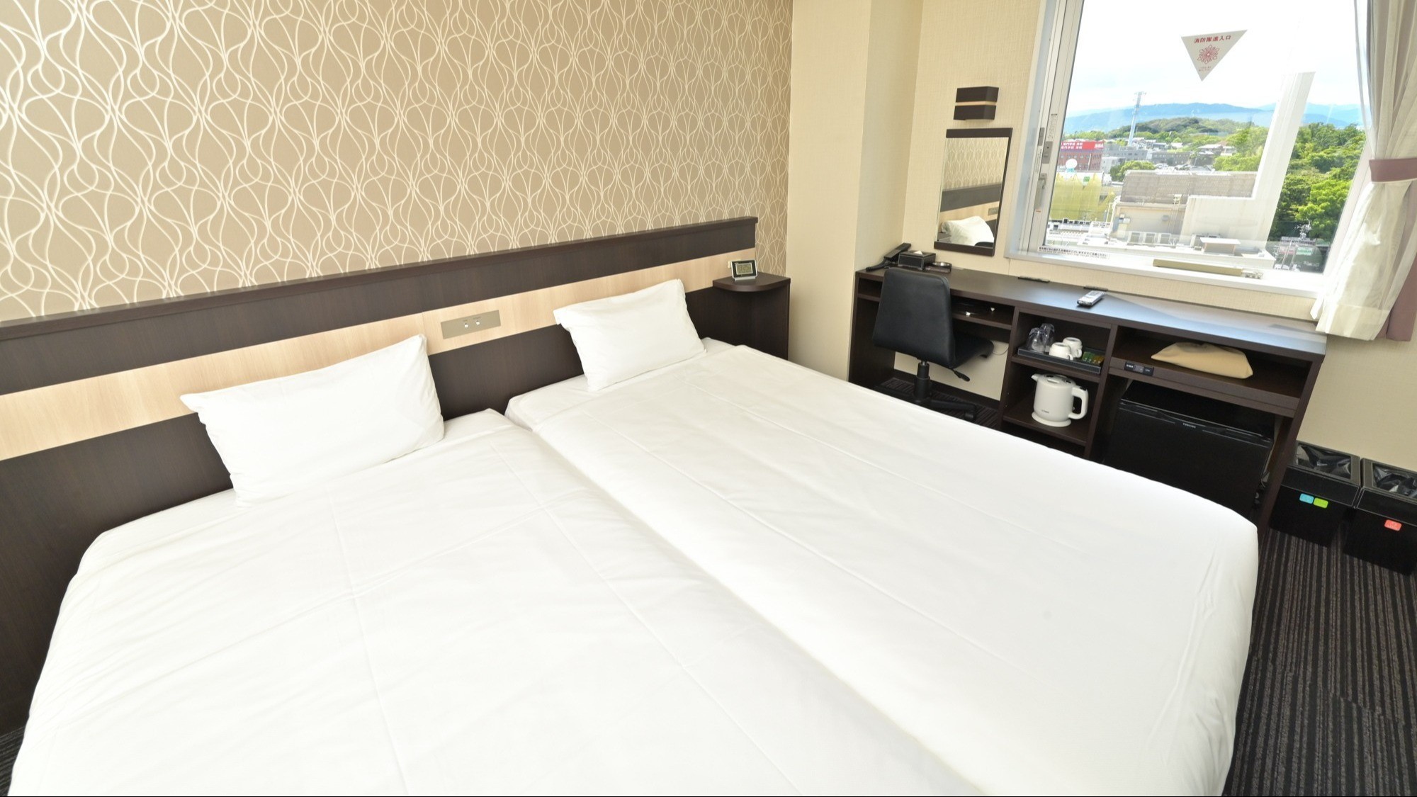 ベッド幅100㎝のシングルベッド2台のお部屋です