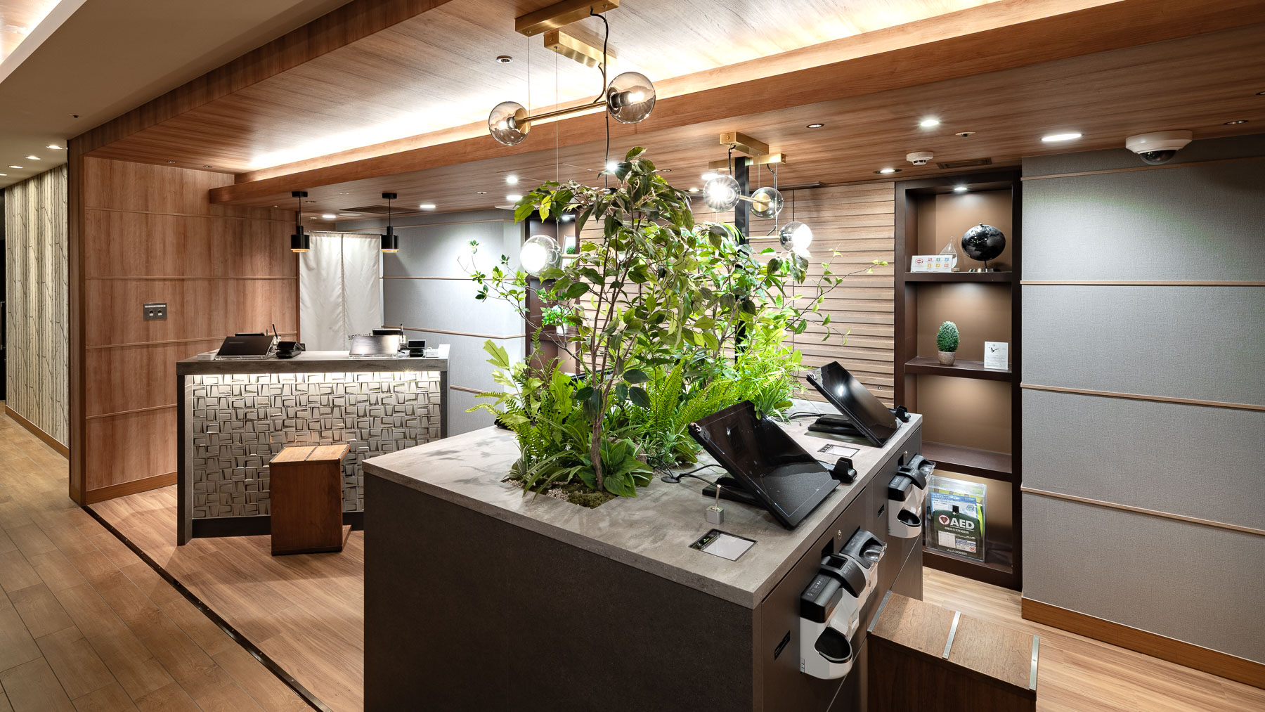 「おかえりなさいませ」こちらでチェックインをお迎えします