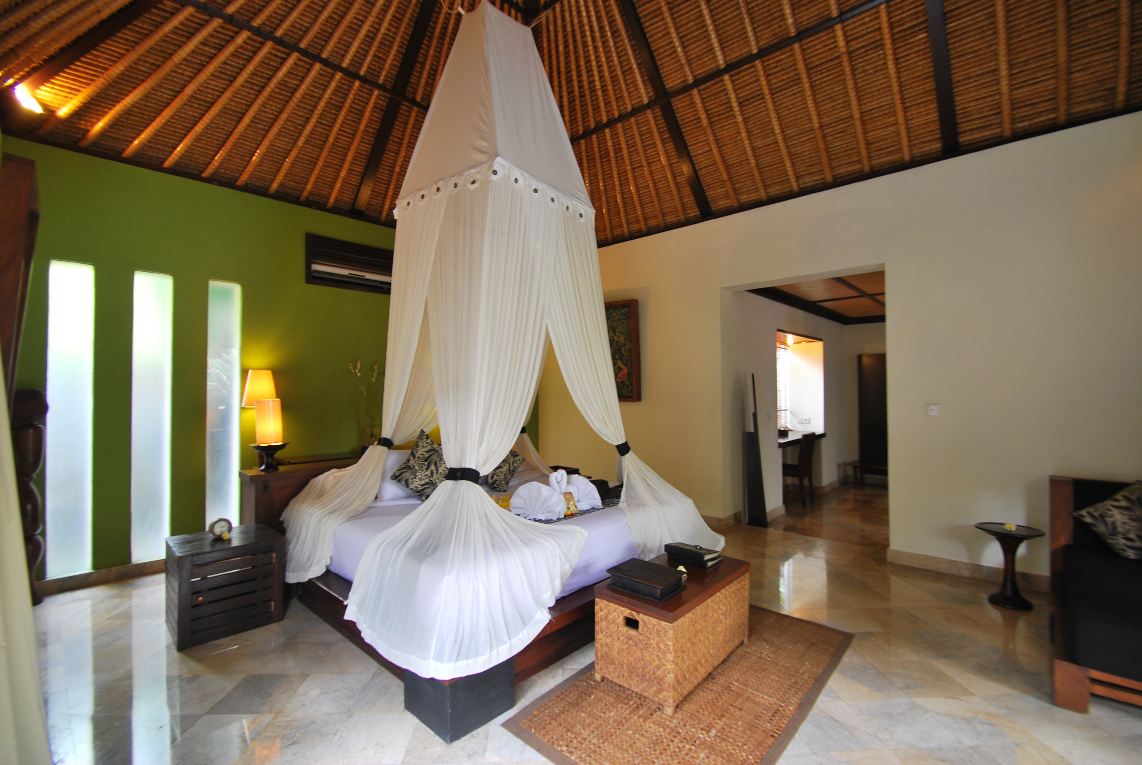 Bedroom with Mosquito net at One Bedroom Pool Vill