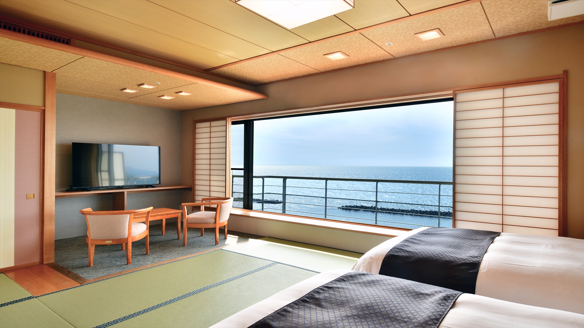 【そよ風館海天楼（和室ベットルーム）】13畳の和室にシングルベットが2台付いた和室ベットタイプ。