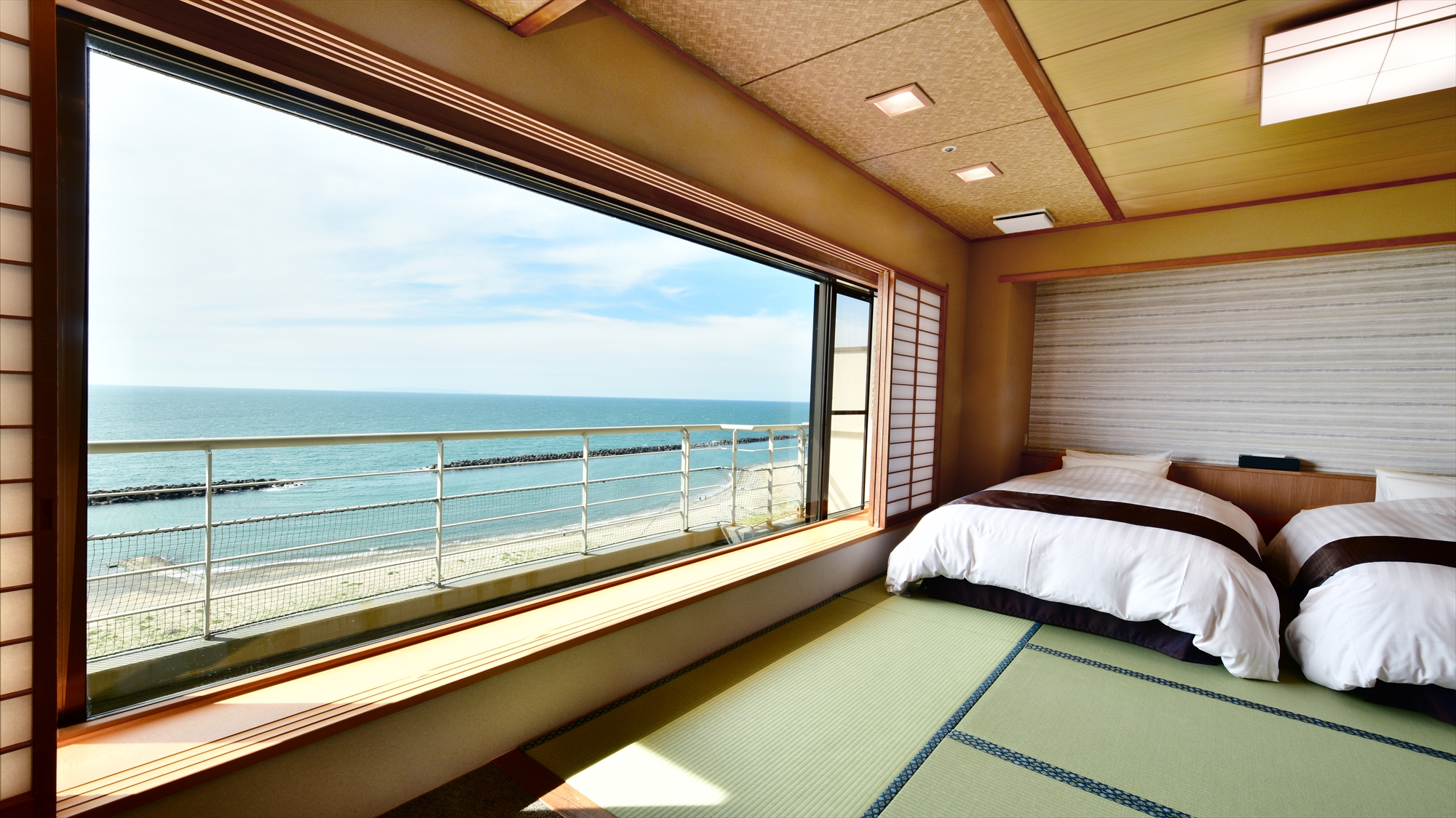 【そよ風館海天楼（和室ベットルーム）】13畳の和室にシングルベットが2台付いた和室ベットタイプ。