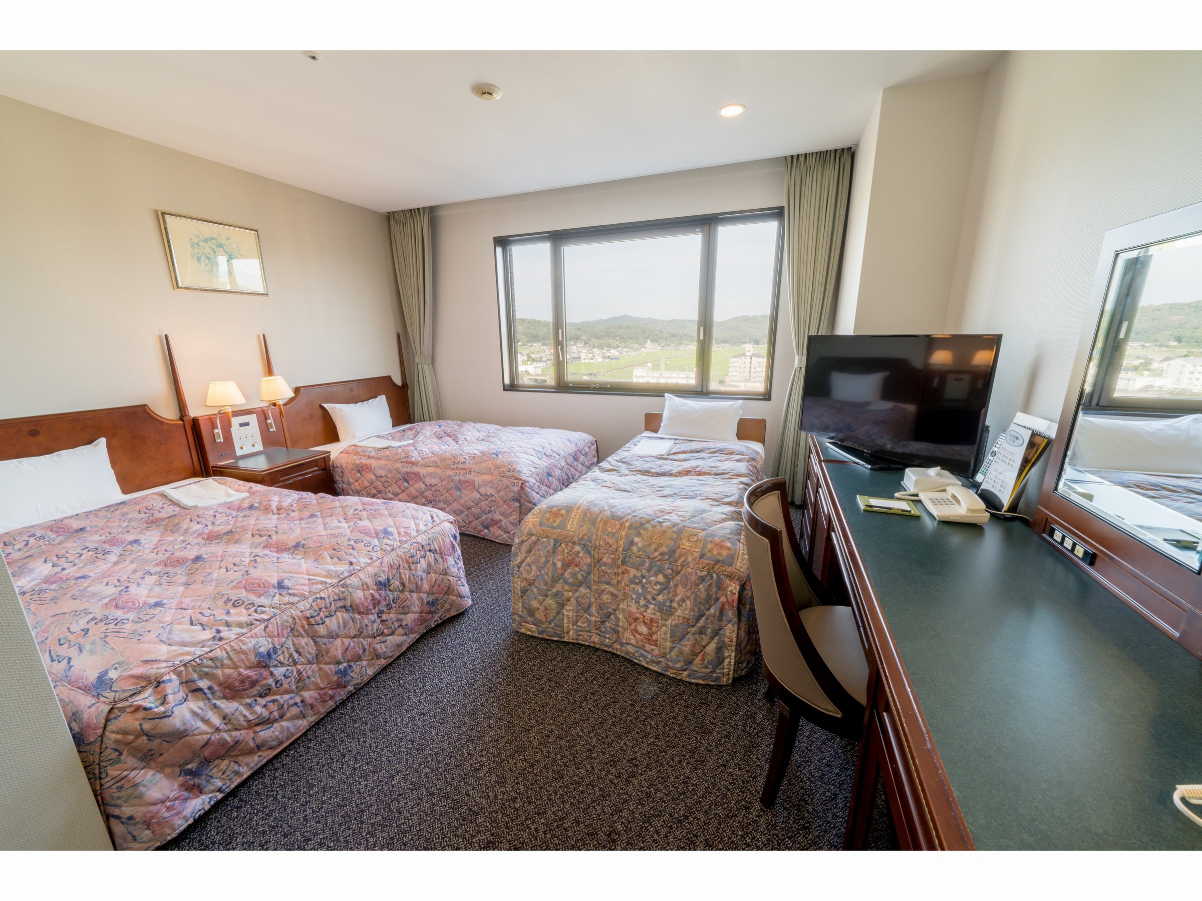 トリプルルームベッド3つの内1つはエキストラベッドです