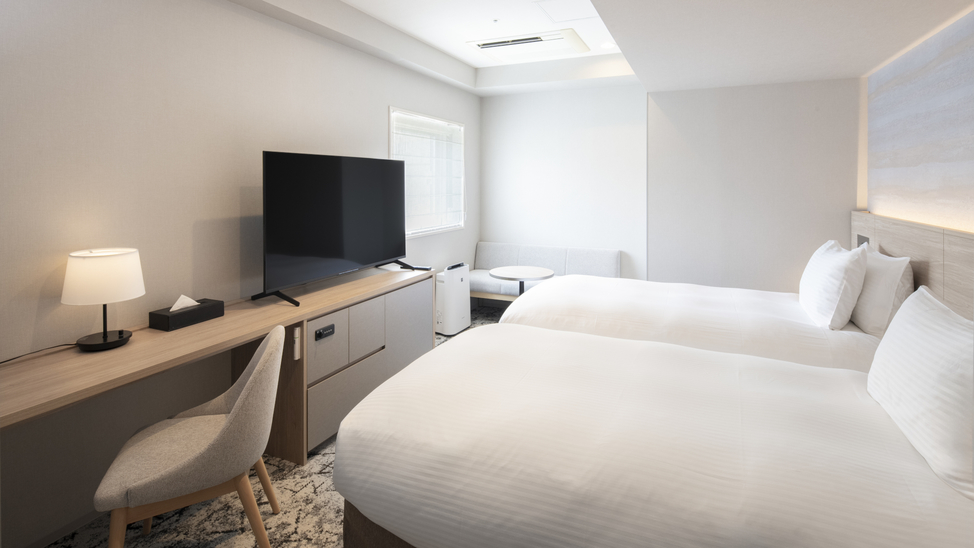 【2025年5月改装】デラックスツイン／25㎡の洋室ツインベッドルームです。バス・トイレ別。