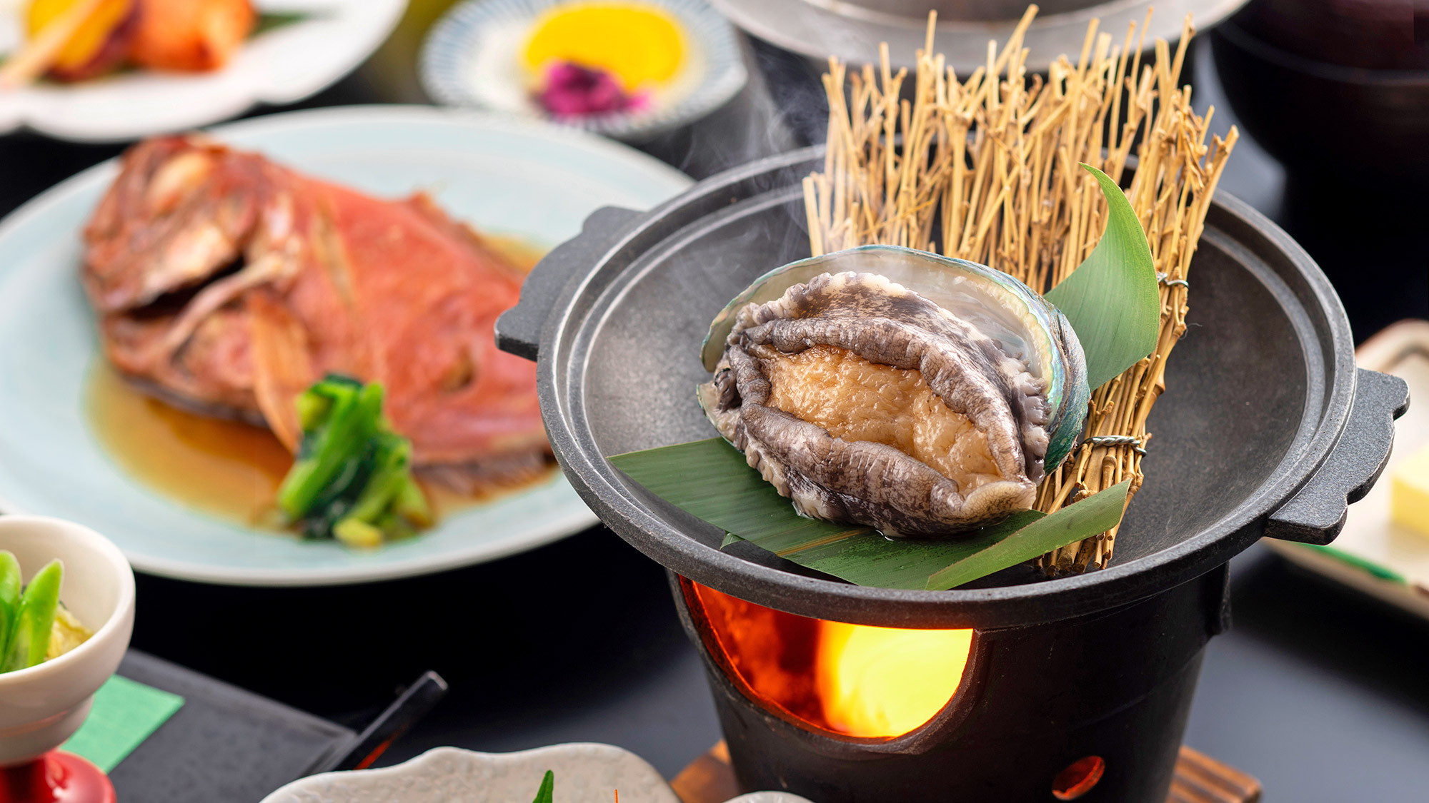 活き鮑の踊り焼き（白波会席・海光会席）