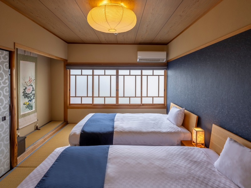 京唐紙の紋様が美しい２階寝室　シモンズ製のマットレスでゆったり