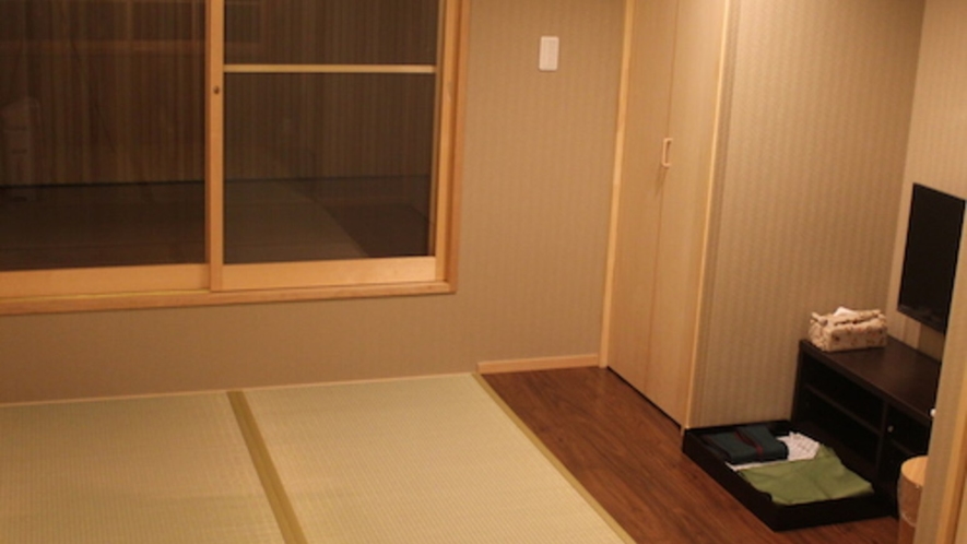 さと居　香雪　客室　２階寝室　２つのベットと寝具となります。