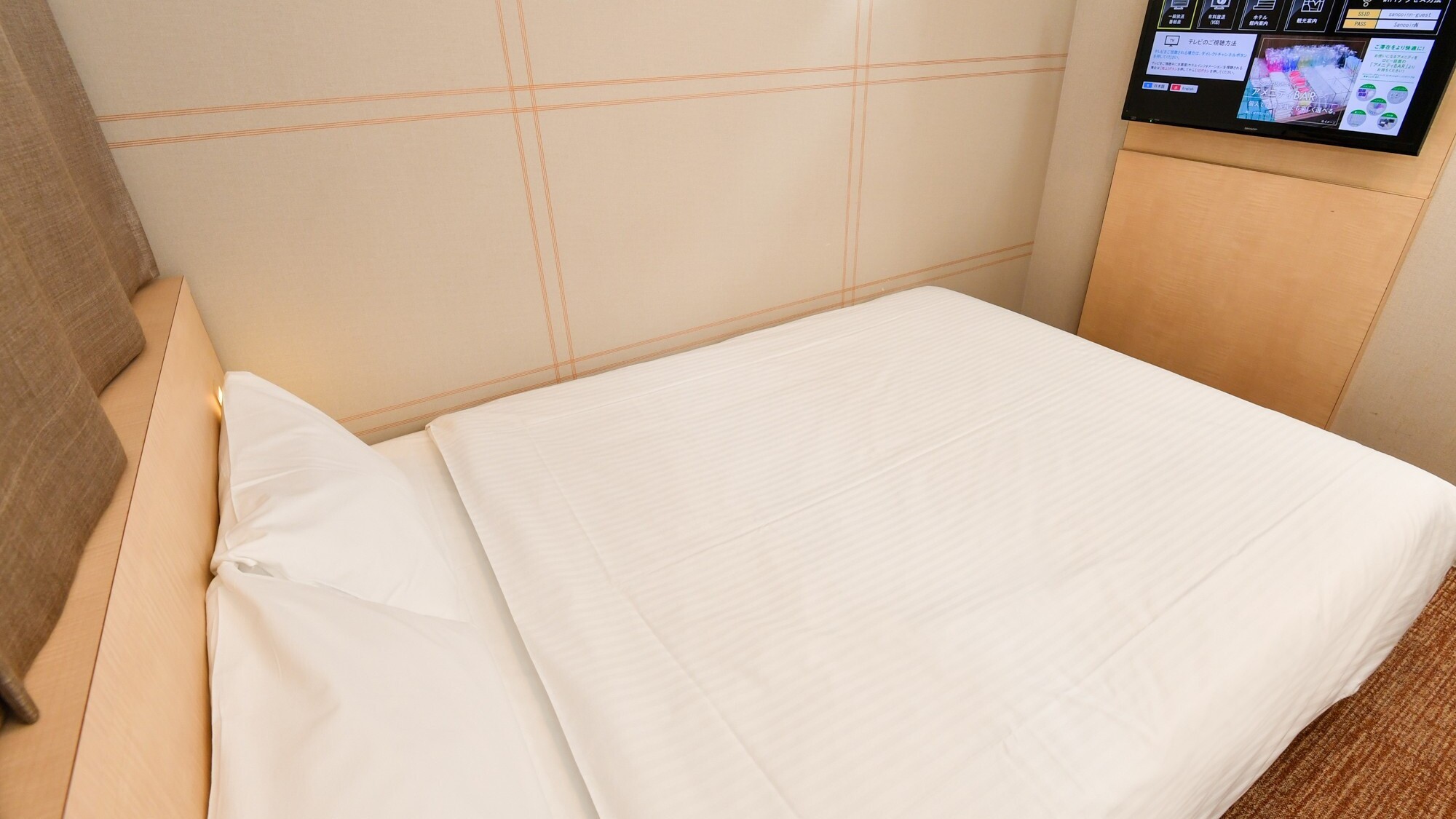 スタンダードダブルルーム | テレビを見ながらお寛ぎください