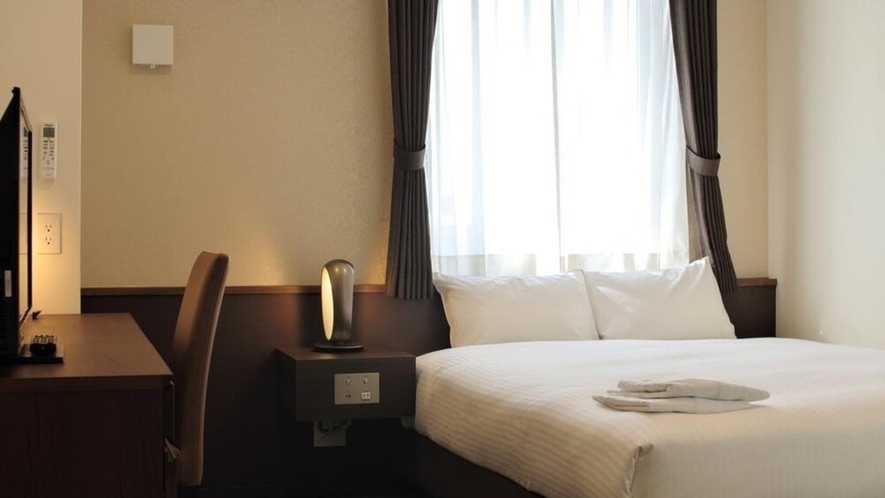 【ダブルルーム】ベッドはゆったり幅160CM。ベッドは国内一流ホテルでも愛用されている日本ベッド