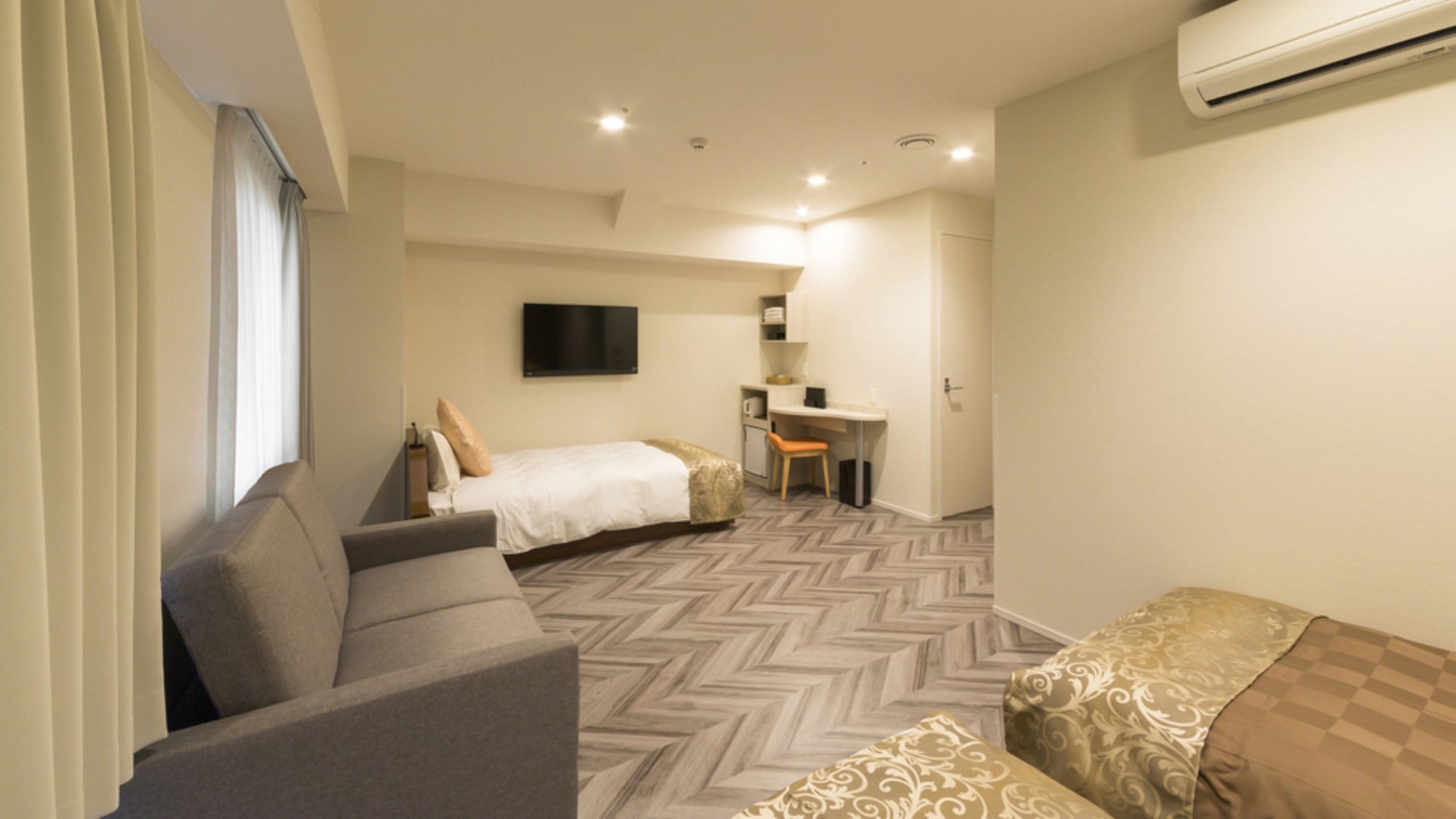 デラックストリプルルーム29平米/3~4名/シングルベッド3台＋ソファーベッド1台