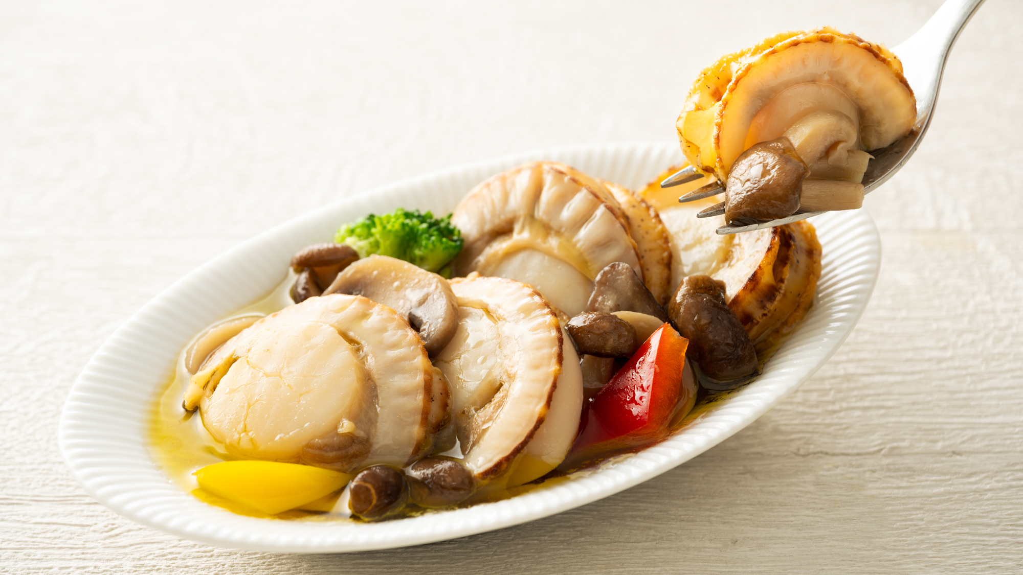 （日替わり）香ばしいガーリックの香りとホタテの旨味が絶妙にマッチ！朝から食欲をそそる一品です。