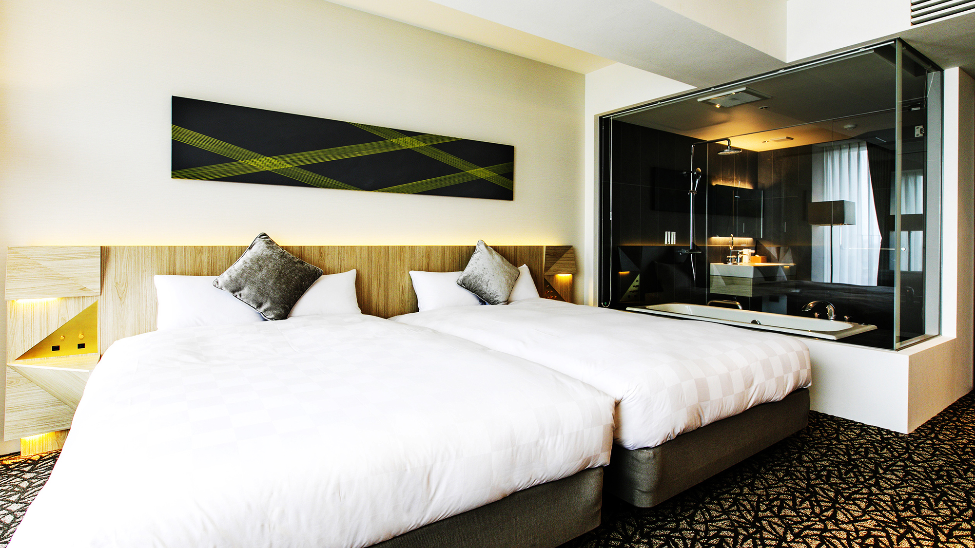【デラックスツイン】　シンプルでモダンな空間に、140cm幅のベッドをご用意。