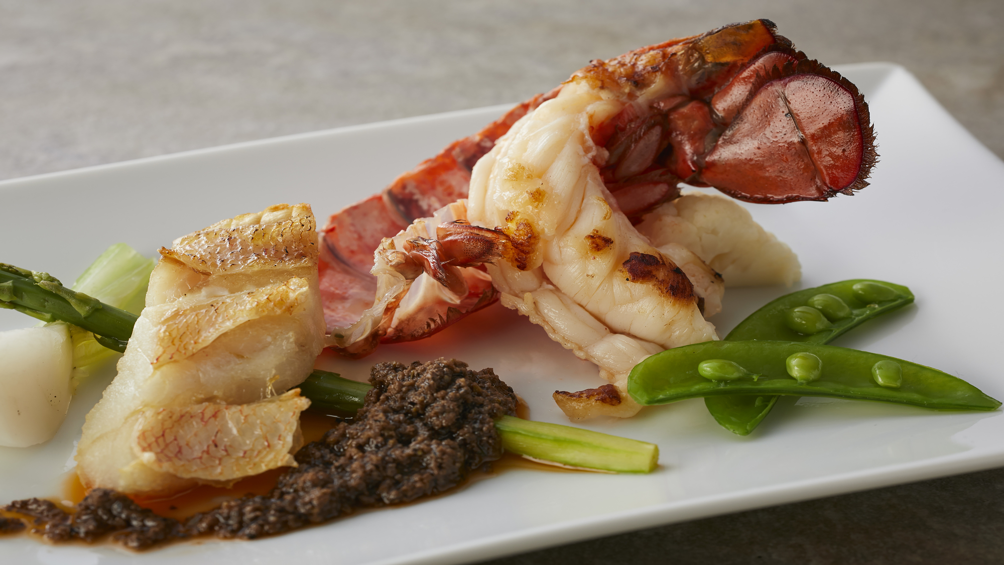 【特選フレンチ(2025冬)】メニュー一例「カサゴのポワレとオマールエビのロースト」