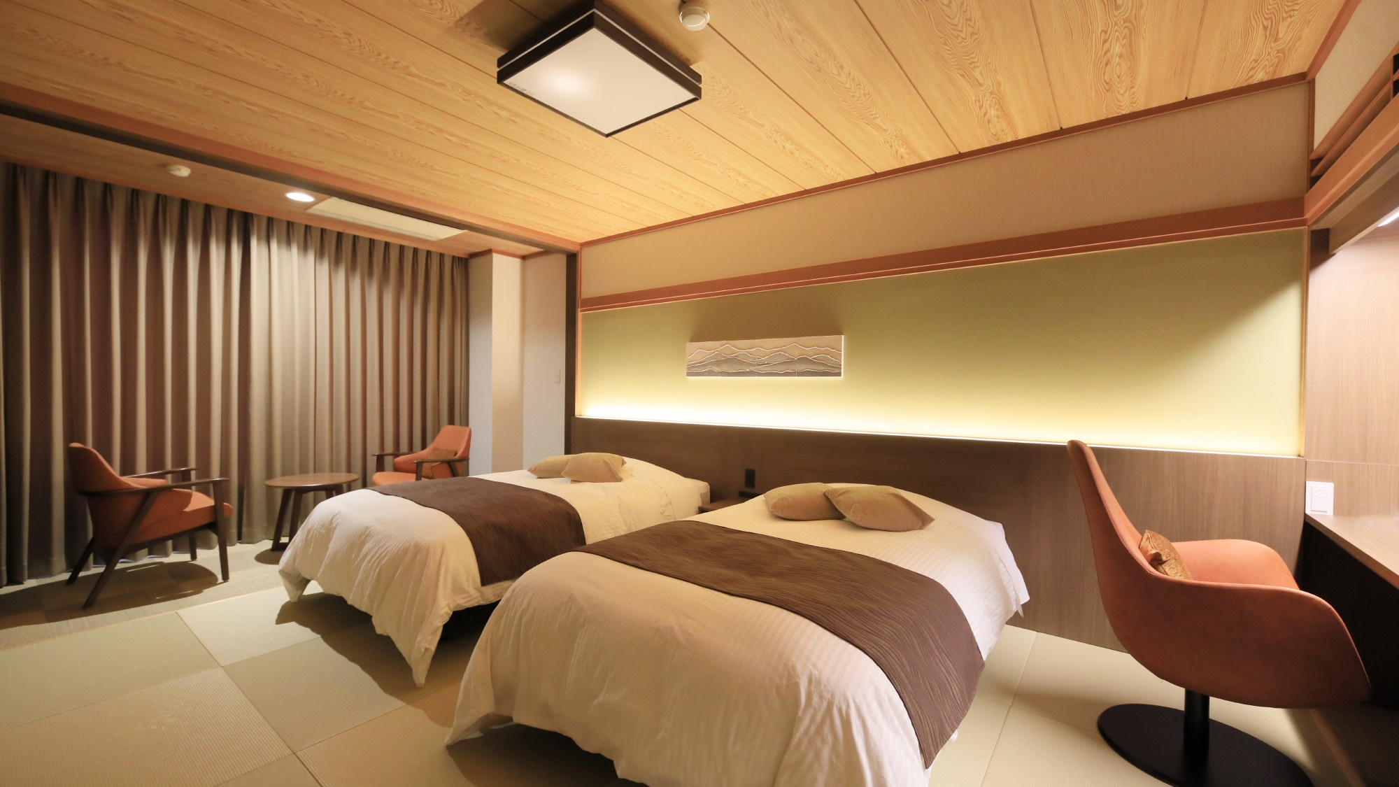 和モダンルーム／ベッドにはエアウィーヴマットレスパッドを採用