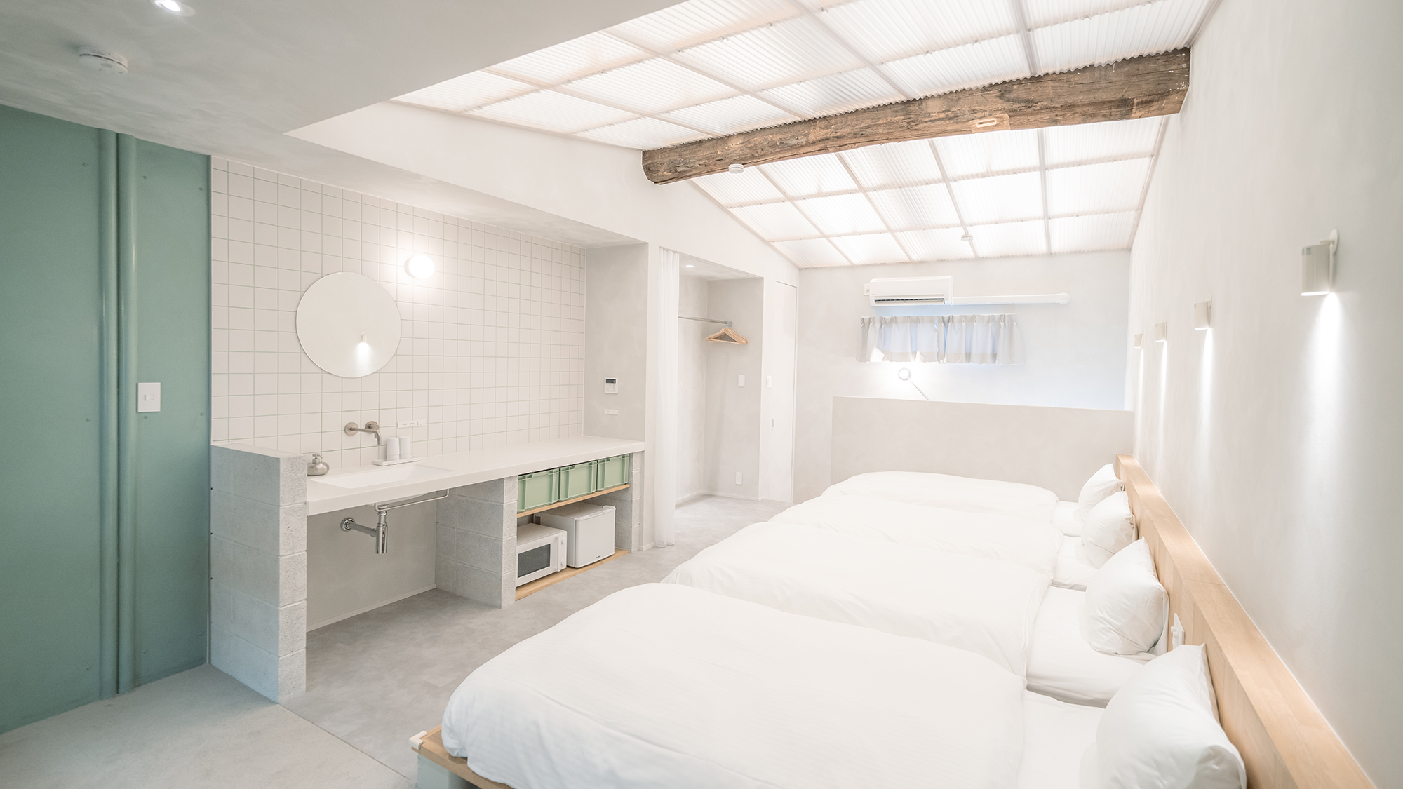 【デラックス商店街ビュー：旧ミセスの用品 松屋】アースグリーンがアクセントの、明るく爽やかな空間