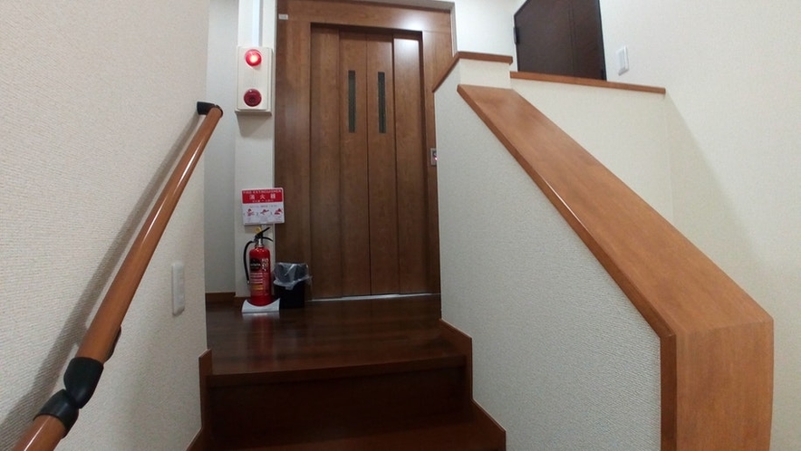 Access between floors by elevator or stairs.