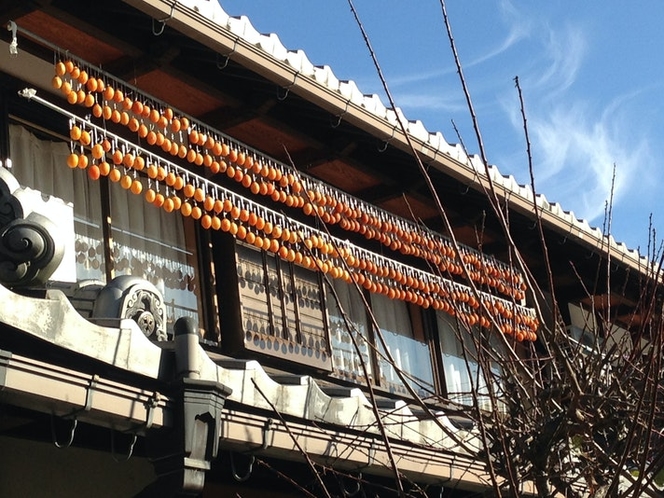 Drying persimmons under the eaves of Guesthouse...