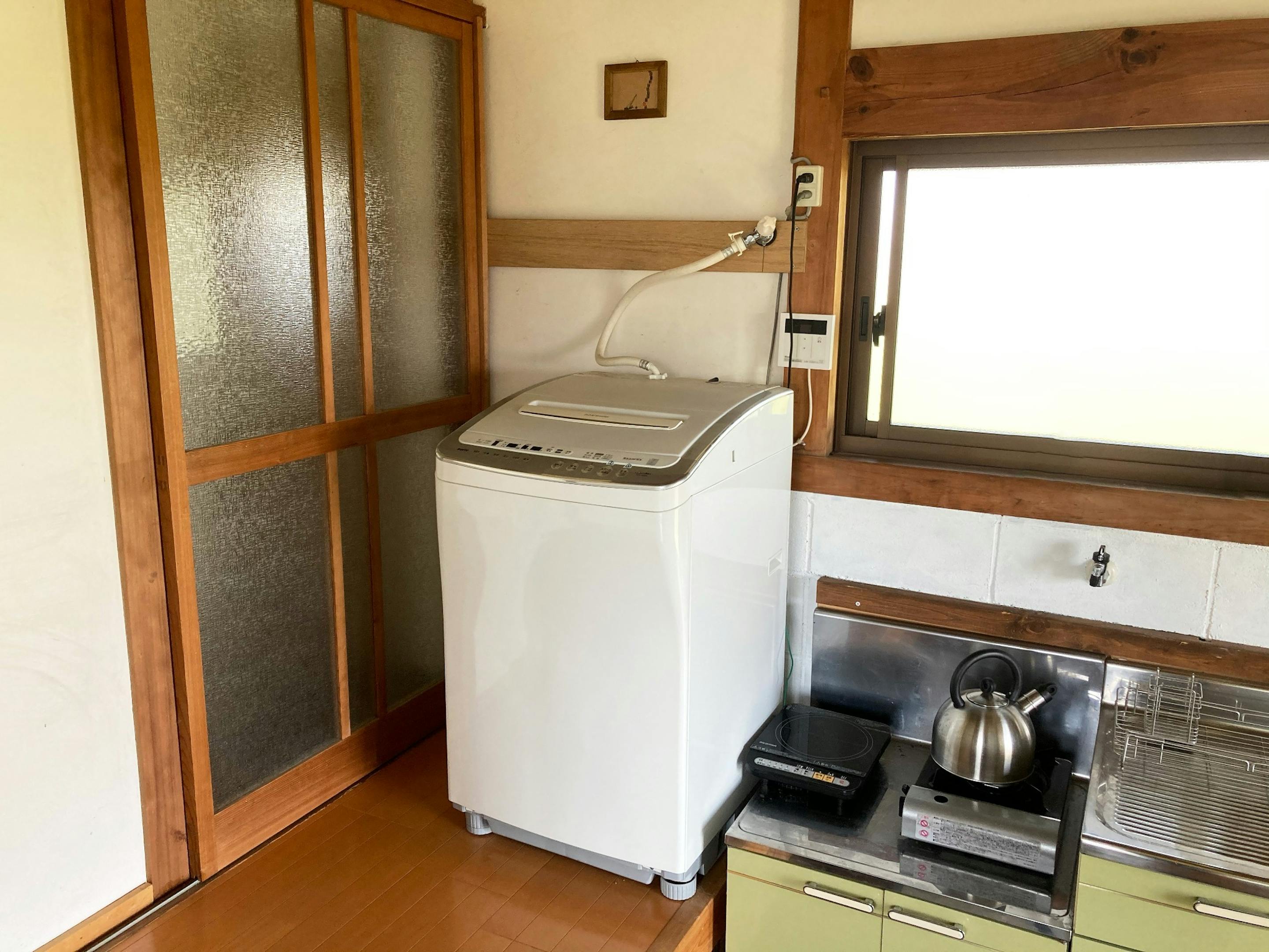 洗濯機　環境への配慮から、洗濯用粉石鹸と自家製柔軟剤をご用意しています