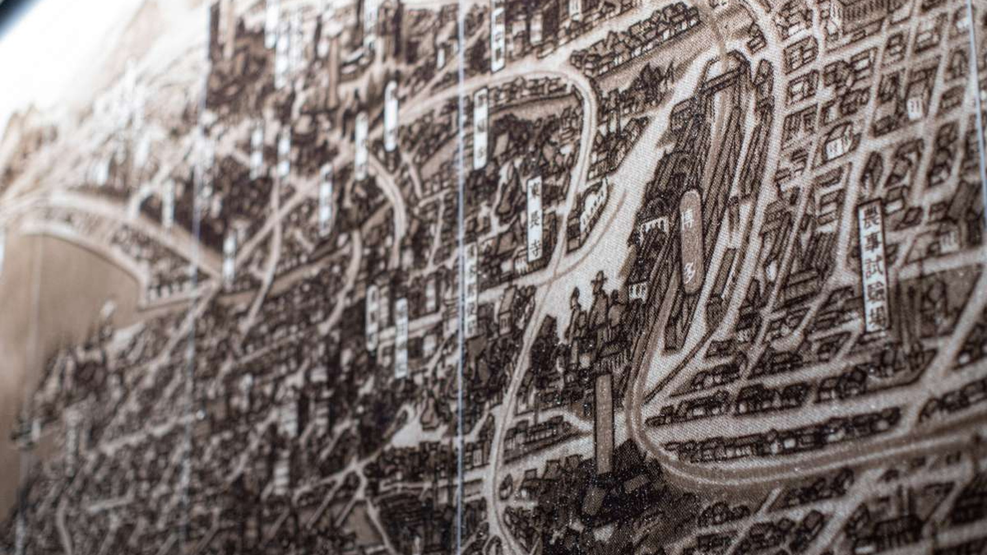 男湯には昭和初期の福岡の市街地を描いた圧巻の「鳥瞰図」