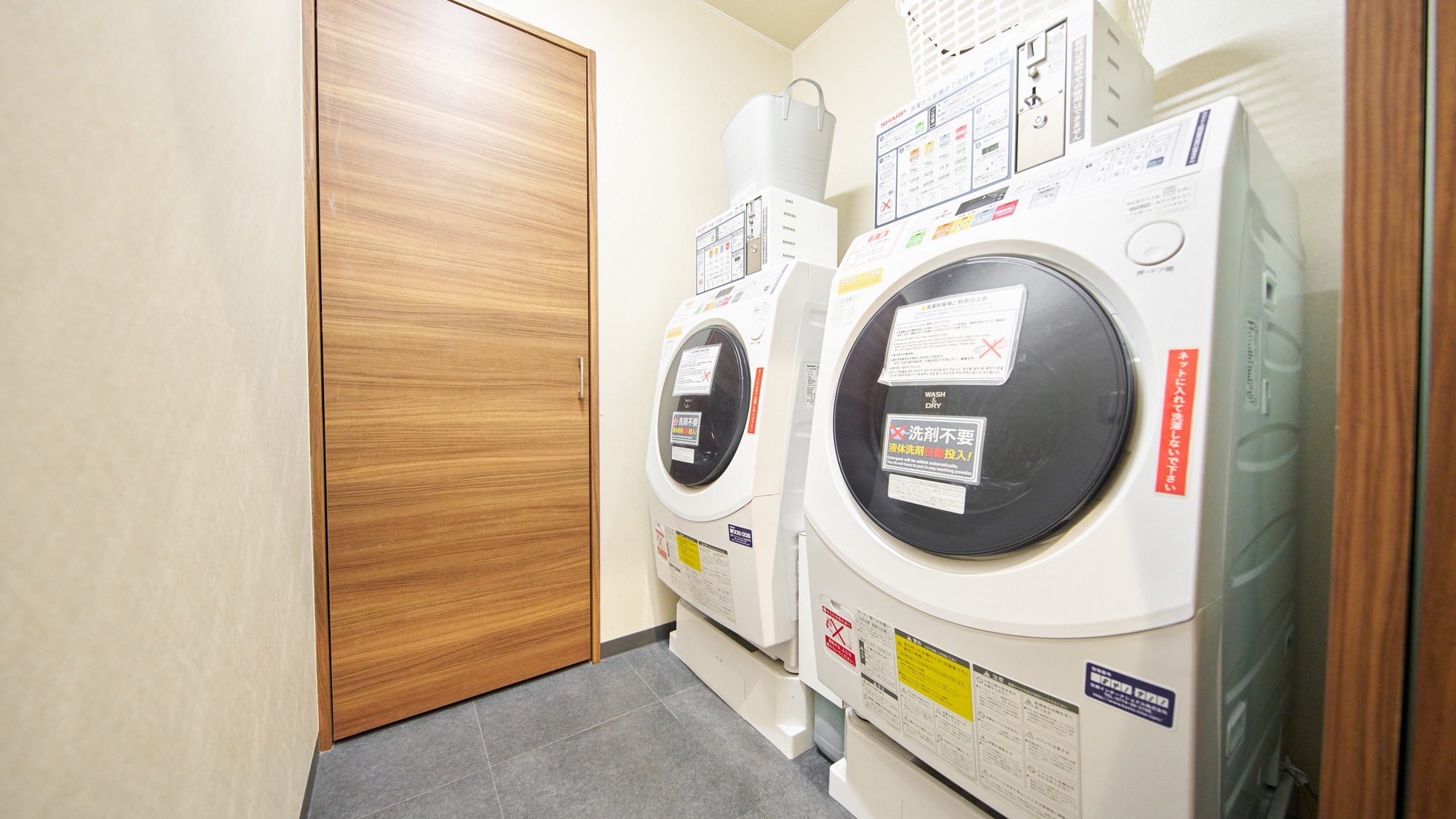 ・【共用設備】洗剤自動投入型の洗濯乾燥機も完備。連泊でも安心してご利用いただけます