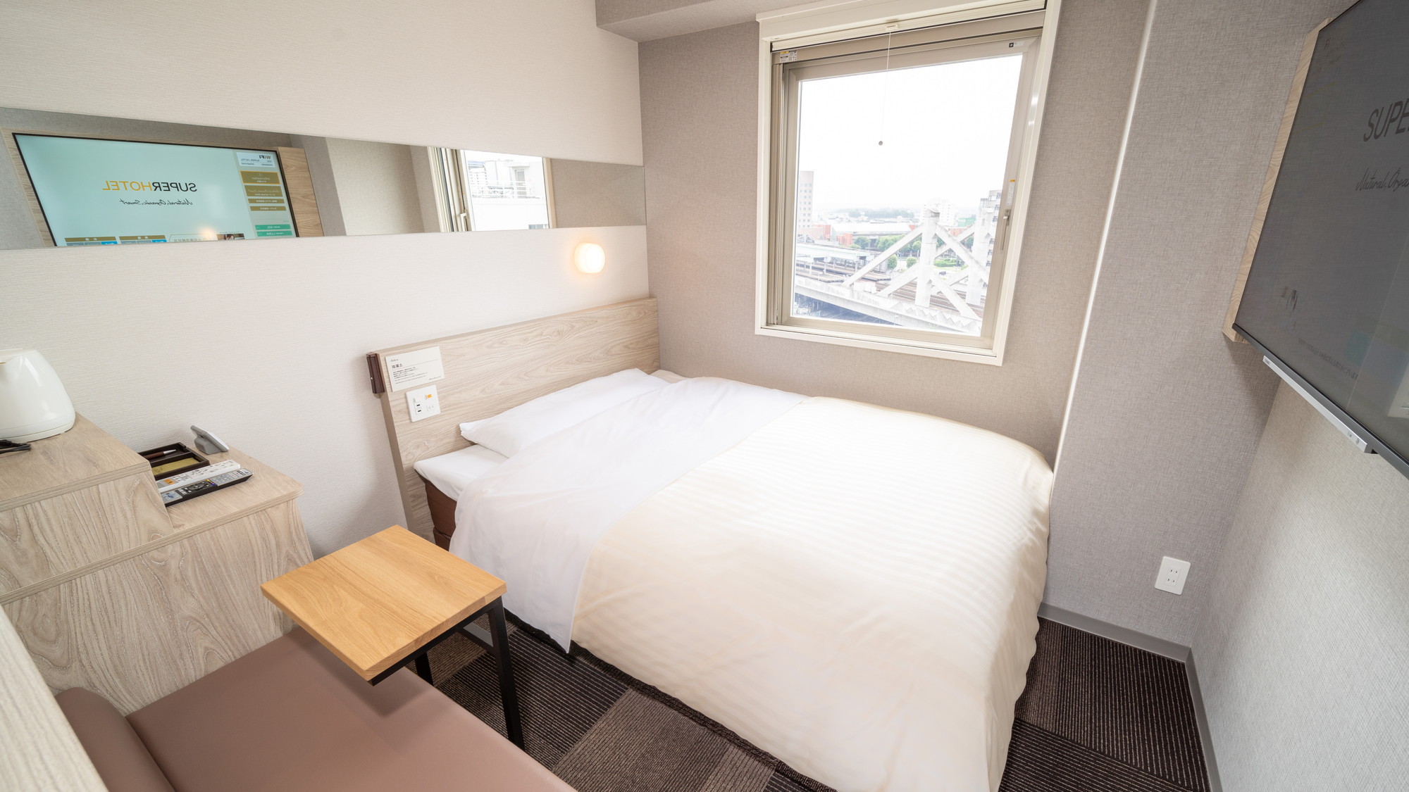 眠りを追及した150cm幅のワイドベッドと適度な硬さのマットでぐっすり