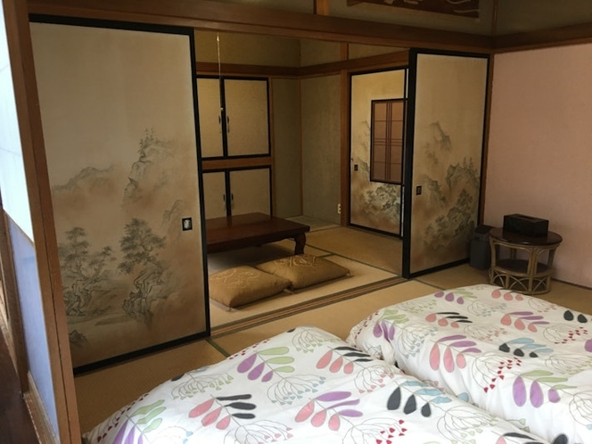 Two rooms divided by Fusuma door.