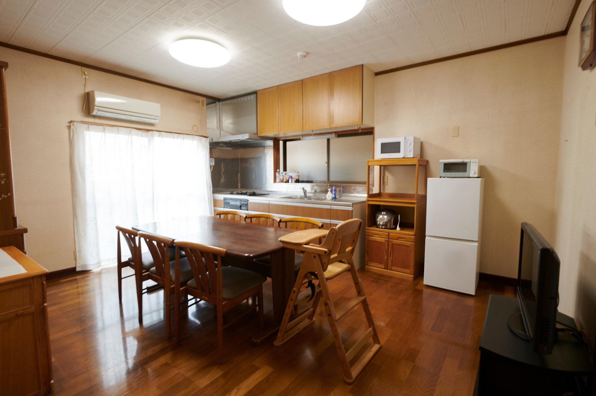 There is a high chair for a baby....