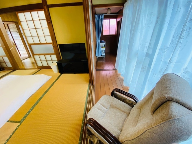 There is a TV in Japanese-style bedroom and...