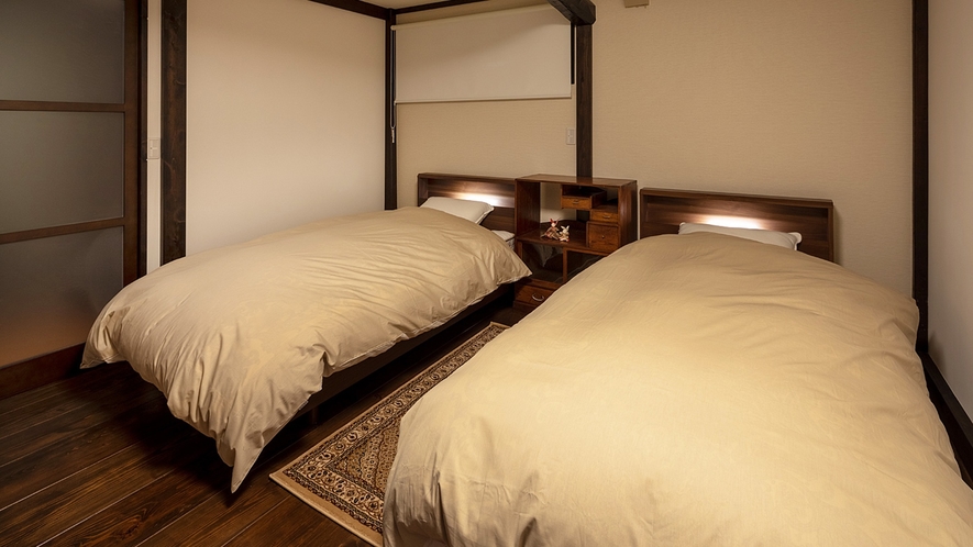 ・「1階寝室」シングルベッド2台を設置