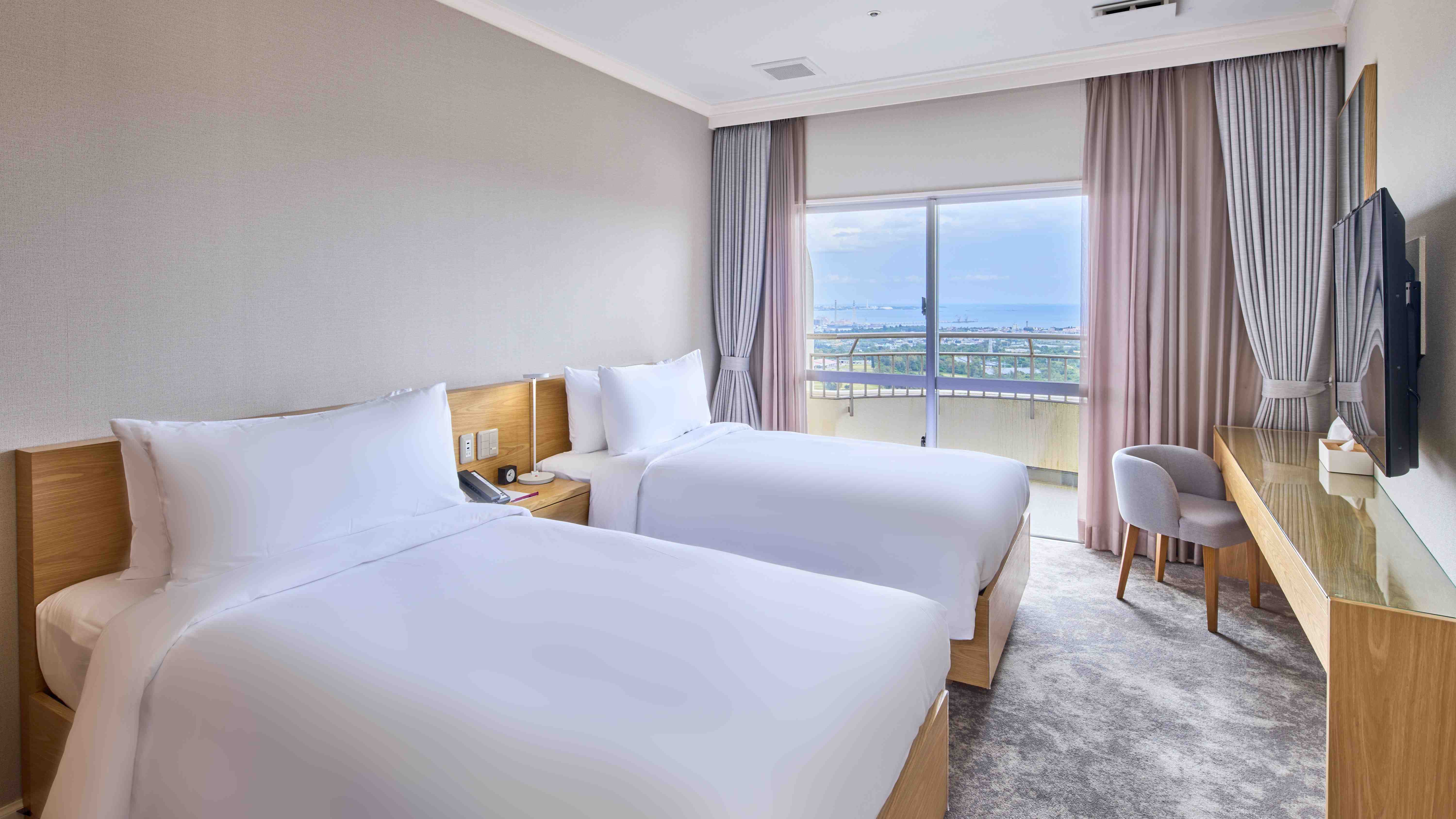 【スタンダードツイン】シングルベッドを2台ご用意しています。