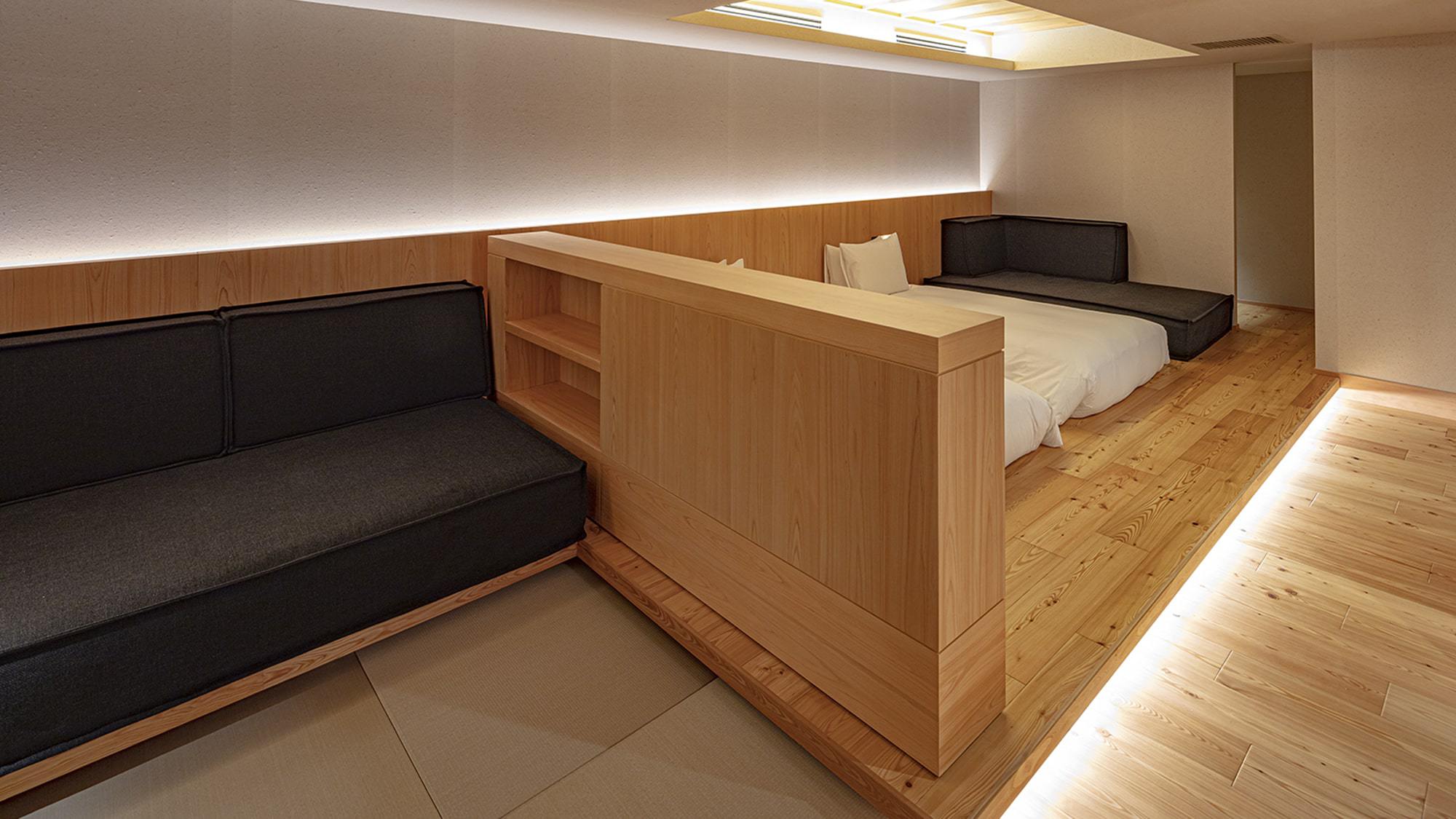 【グランドツイン】62㎡／ベッド幅1,200mm+ソファベッド　広々としたソファを配しております。