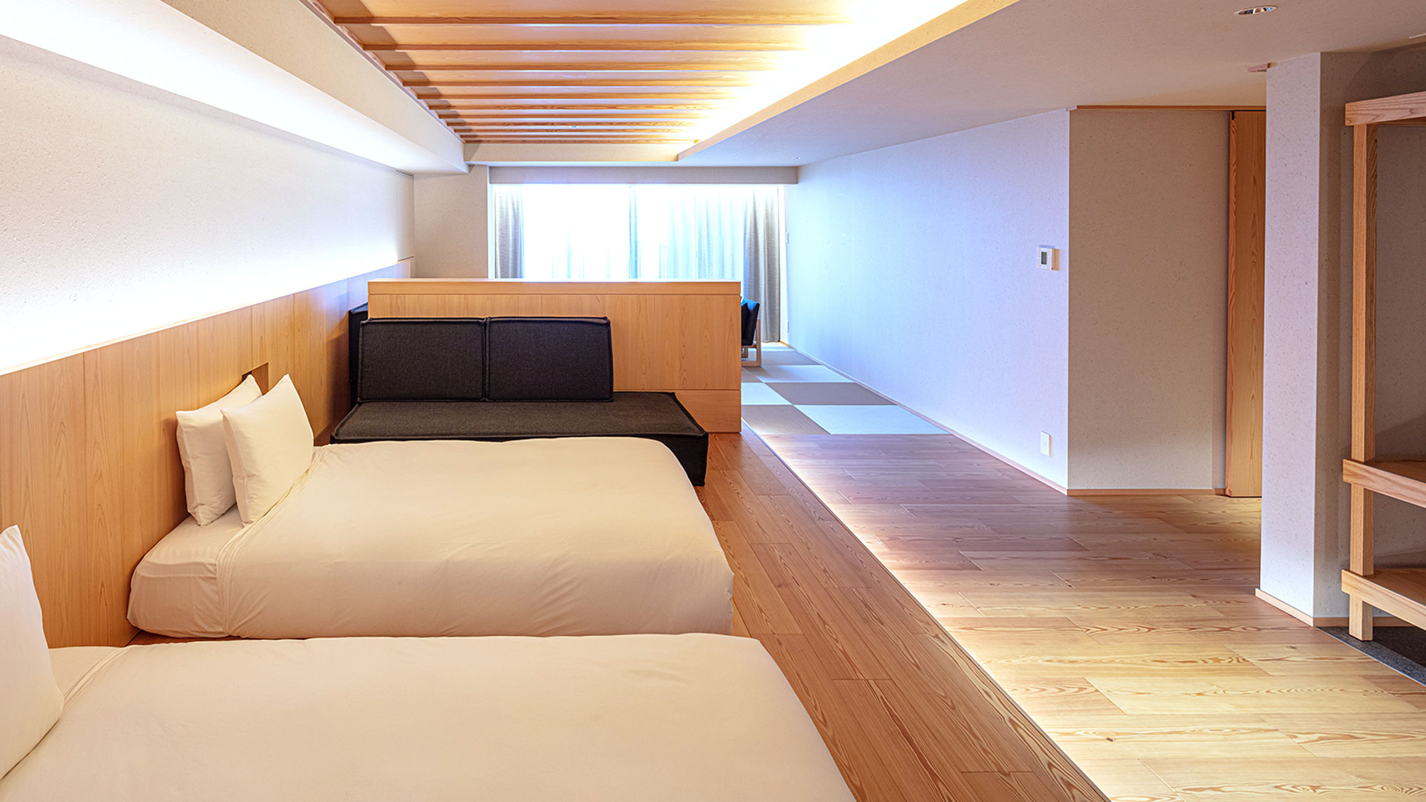 【プレミアムスイート】62㎡／ベッド幅1,200mm+ソファベッド　温もりを感じるお部屋をご用意。