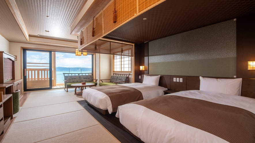 【和洋フォース一例】居間のツインベッドとは別に、独立したツインタイプの寝室を設けております。