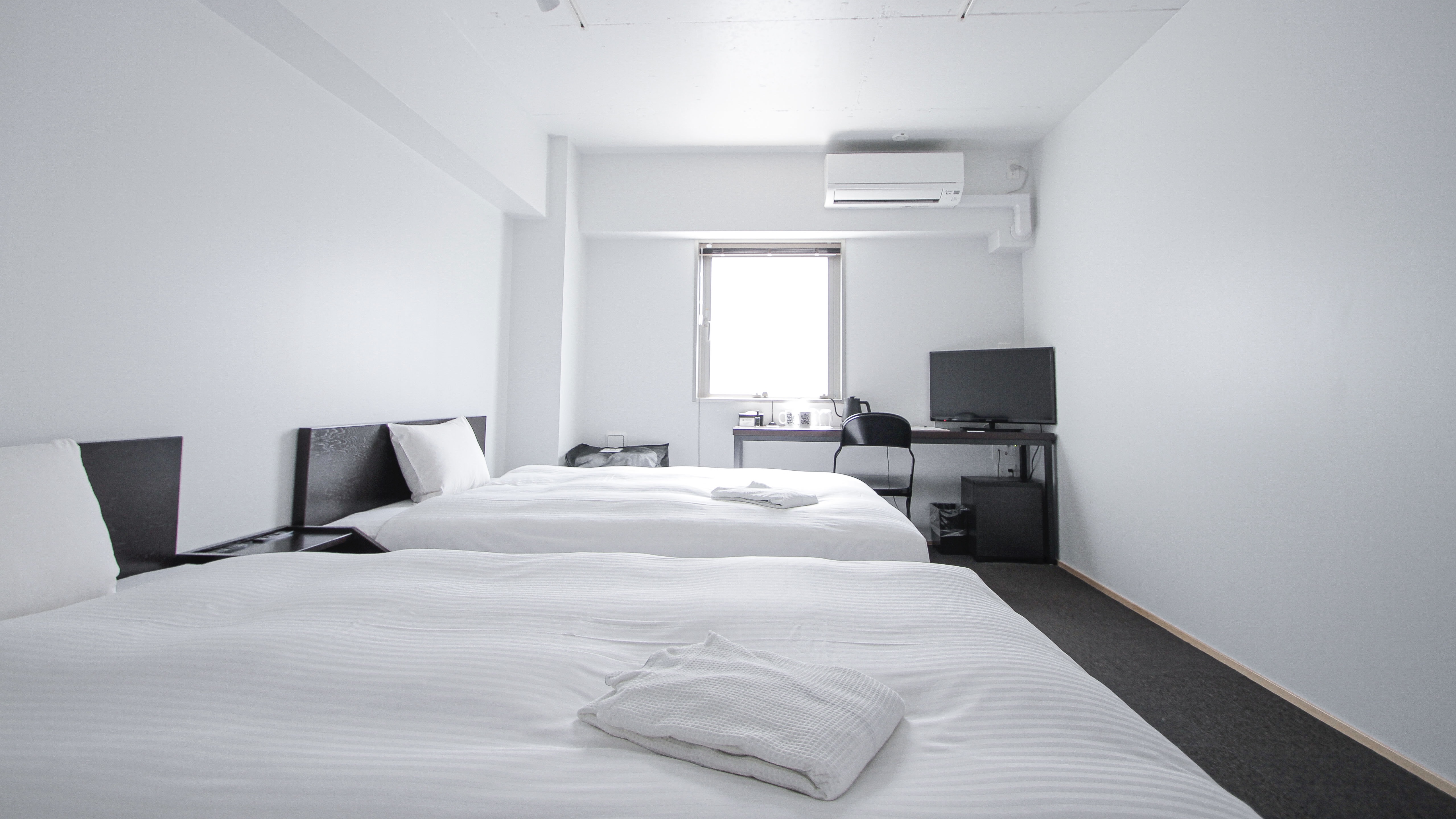 ツインルーム(22㎡/ベッド幅140cm&times;1台、120cm&times;1台/定員１~3名）