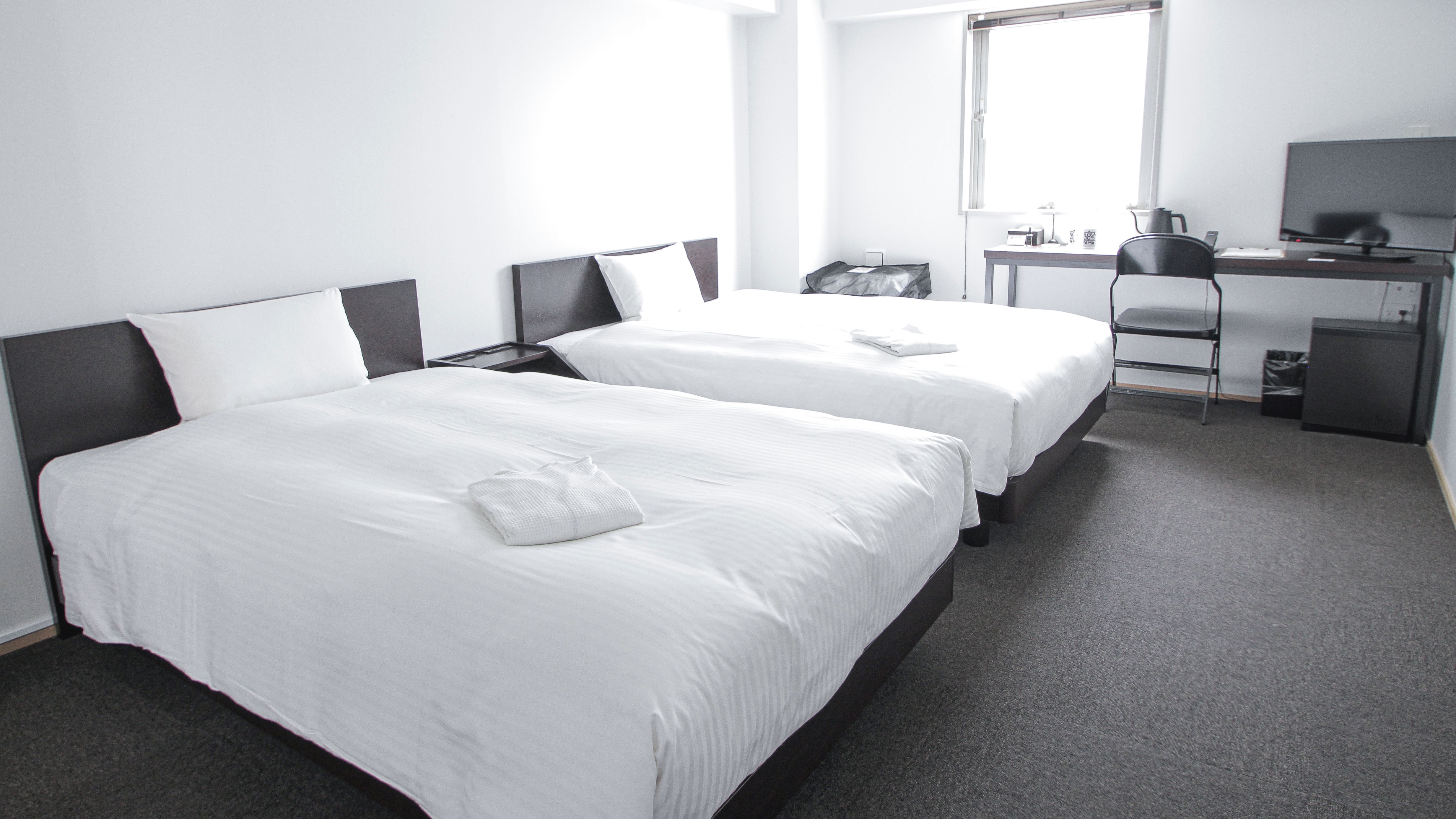 ツインルーム(22㎡/ベッド幅140cm&times;1台、120cm&times;1台/定員１~3名）